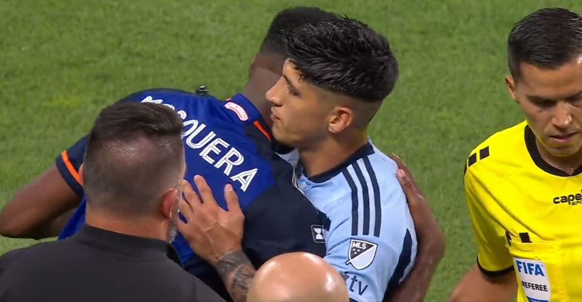 Alan Pulido pictured (center) hugging Yerson Mosquera just 60 seconds after headbutting him during a Leagues Cup game in July 2023